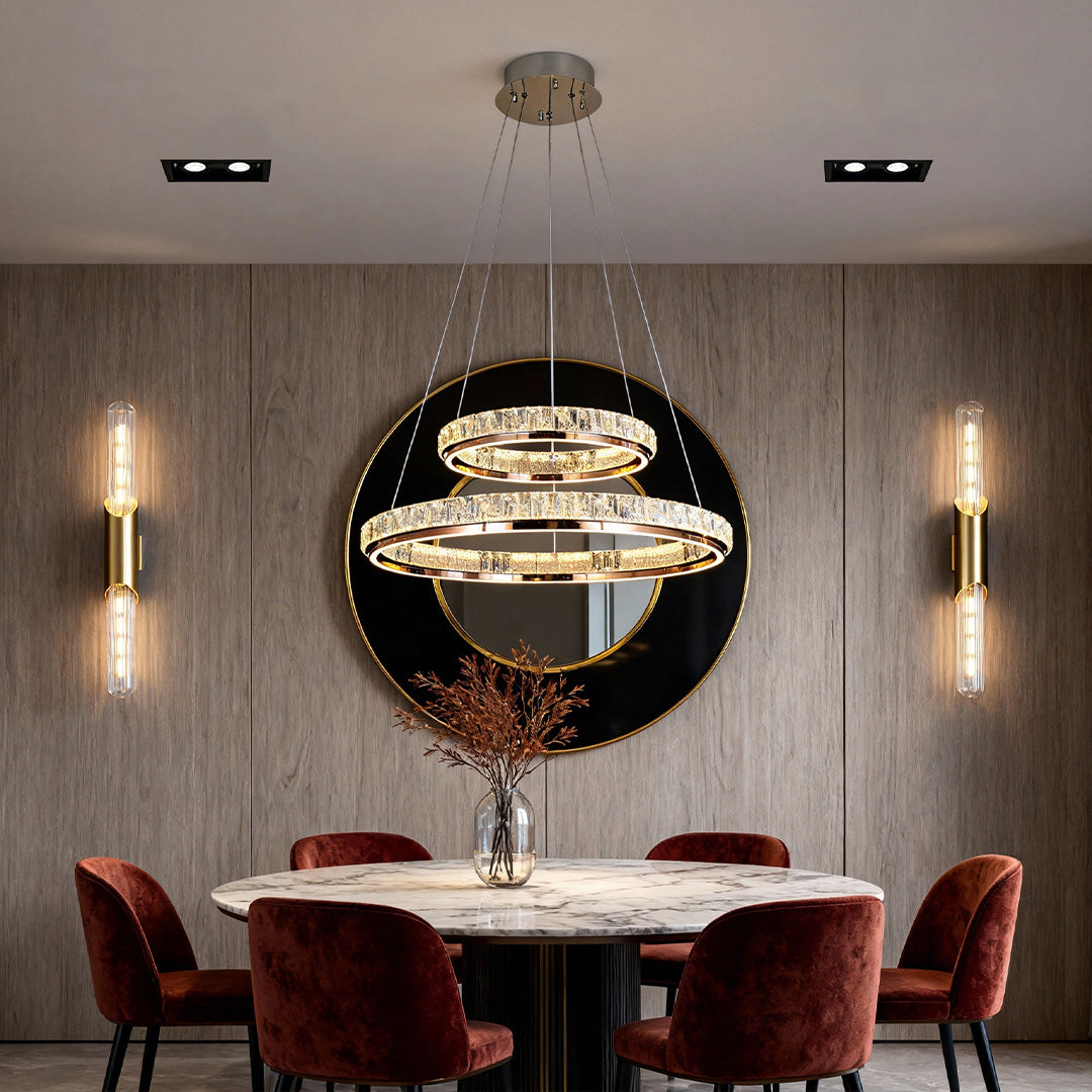 Gold Crystal Chandelier with Brass Wall Sconces and Recessed LED Lights