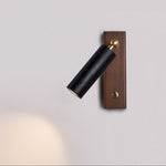 Event Horizon Adjustable Wall Sconce in Black Travertine and Brass