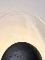 Eclipse Shell Wall Sconce in Black Travertine with LED