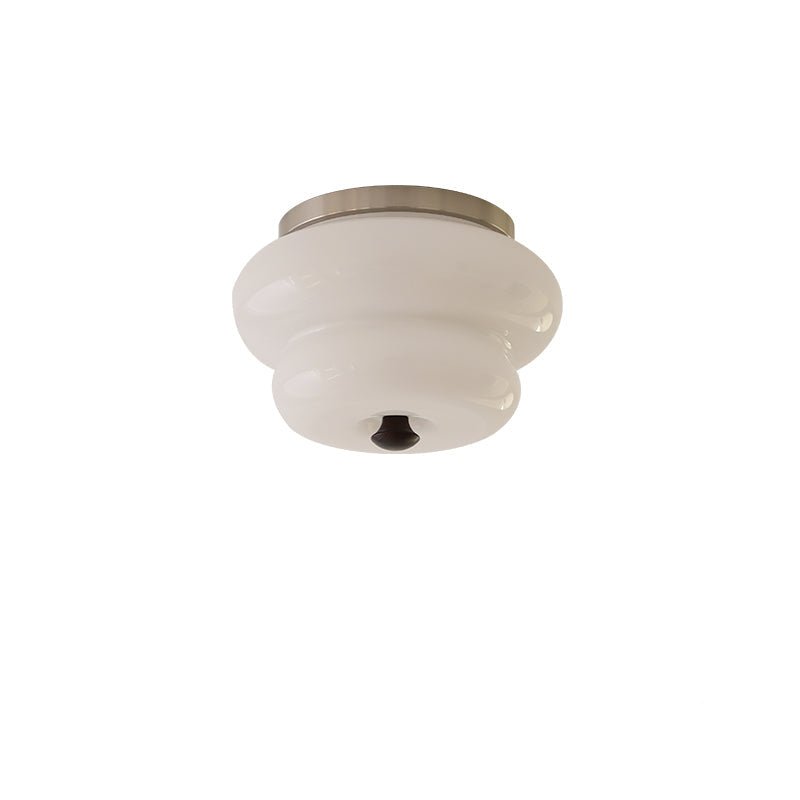 Curvaceous Flush Mount Ceiling Light with Gold Accents and Glass Shade