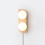Elysian Travertine Plug-in Wall Sconce with Glass Globes