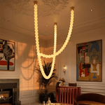 Halti Necklace Acrylic Chandelier with Gold Accents and Integrated LED