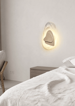 Eira Travertine Wall Sconce with Glass Shade for Modern Interiors