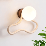 Driftform Travertine Wall Sconce with Opal Glass Globe