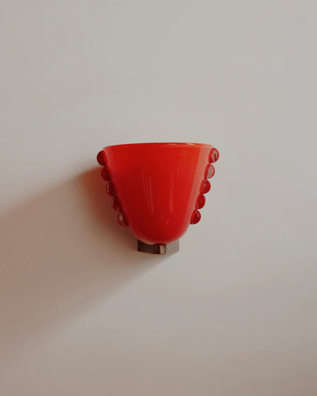 Velora Sculptural Wall Sconce in Matte Gold with Glass Shade