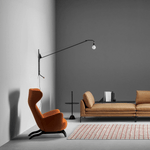 Modern Swing Arm Wall Sconce with Extended Reach in Matte Black