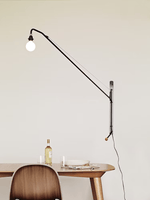 Modern Swing Arm Wall Sconce with Extended Reach in Matte Black