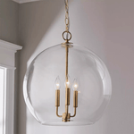 Lysander Clear Glass Globe Pendant Light in Aged Brass
