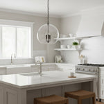 Lysander Clear Glass Globe Pendant Light in Aged Brass