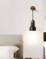 Vulkan Drop Wall Sconce in Black Travertine and Walnut