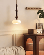 Solvra Modern Wood and Amber Glass Pendant Light for Dining Room