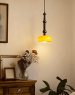 Solvra Modern Wood and Amber Glass Pendant Light for Dining Room