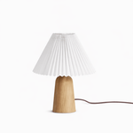 Pleara Sculpted Wood Table Lamp with Pleated Fabric Shade