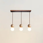 Camille Travertine Pendant Light – Natural Stone Sphere with Opal Glass Globe