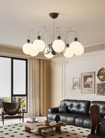 Aurora Loop Modern Chandelier with Walnut Accents and Glass Globes