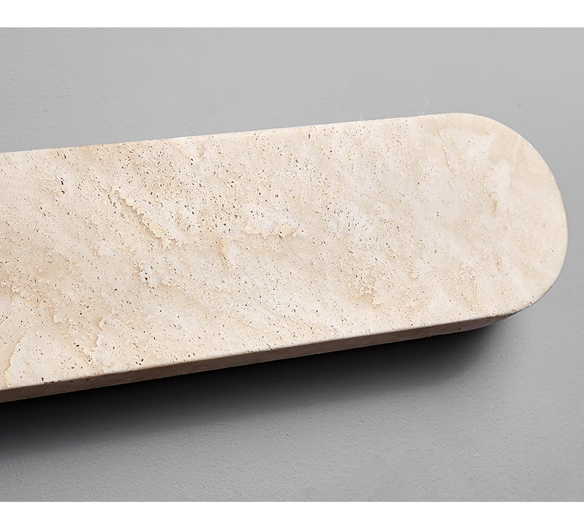 Lior Sculptural Travertine LED Wall Sconce for Modern Interiors