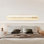 Lior Sculptural Travertine LED Wall Sconce for Modern Interiors
