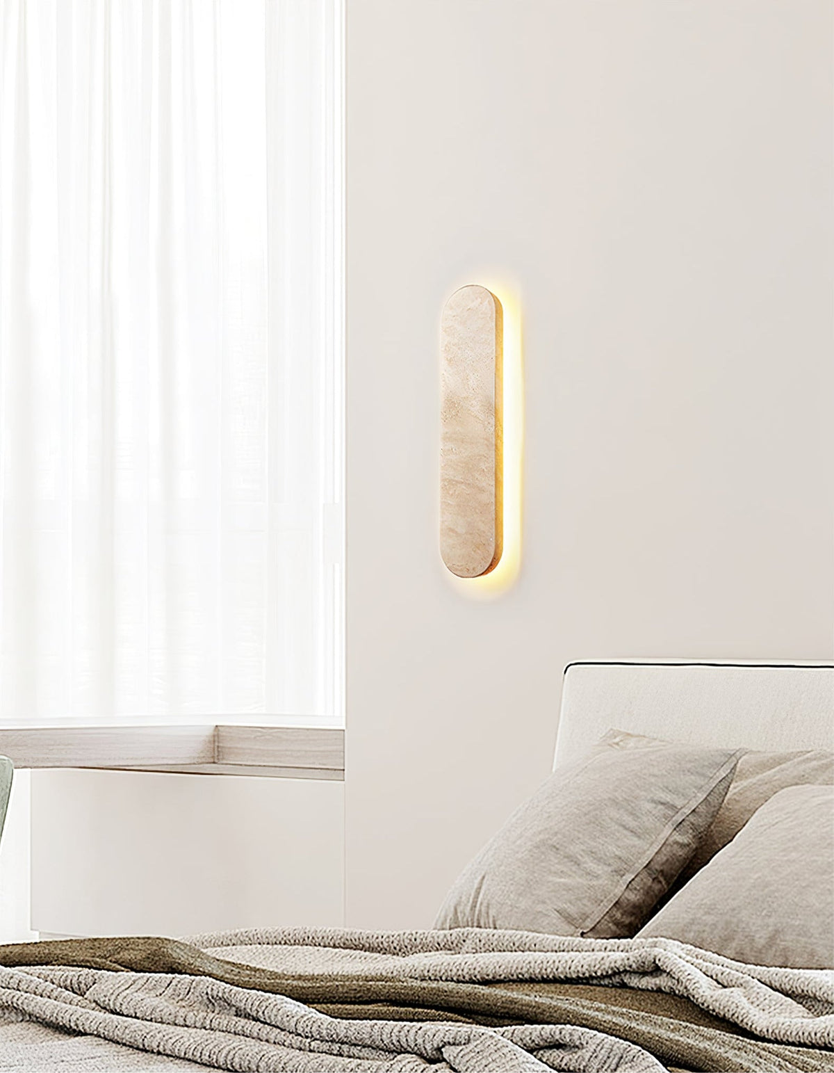Lior Sculptural Travertine LED Wall Sconce for Modern Interiors