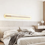 Lior Sculptural Travertine LED Wall Sconce for Modern Interiors