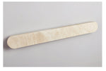 Lior Sculptural Travertine LED Wall Sconce for Modern Interiors