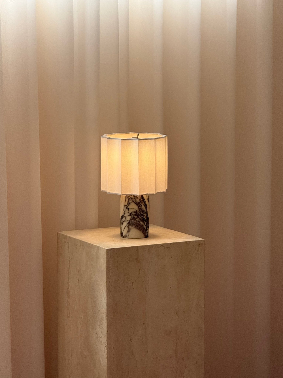 Orbis Veil Table Lamp – Sculptural Marble LED Lamp with Pleated Fabric Shade
