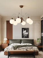 Aurora Loop Modern Chandelier with Walnut Accents and Glass Globes