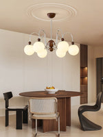 Aurora Loop Modern Chandelier with Walnut Accents and Glass Globes
