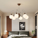 Aurora Loop Modern Chandelier with Walnut Accents and Glass Globes