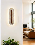 Aerin Lumaslot Wall Sconce in Natural Travertine with Warm LED Glow