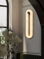 Alabaster Capsule Wall Sconce in Natural Stone with Black Mount