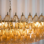 Amber Sorrento Multi-Tier Glass Chandelier, 59-Inch Wide Statement Lighting