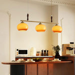 Amber Trio Pendant Light – Brass & Wood Linear Chandelier