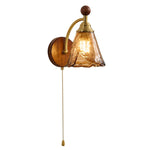 Amberveil Bloom Wall Sconce with Amber Glass Shade and Brass Accents