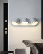 Lumina 360° Adjustable Plug-In LED Wall Sconce in Black or White
