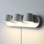 Lumina 360° Adjustable Plug-In LED Wall Sconce in Black or White