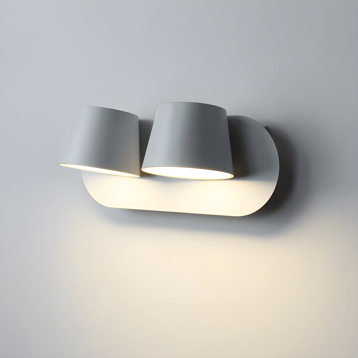 Lumina 360° Adjustable Plug-In LED Wall Sconce in Black or White