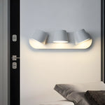 Lumina 360° Adjustable Plug-In LED Wall Sconce in Black or White