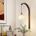 Ardent Wood Wall Sconce with Pleated Glass Shade and Brass Accents