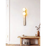 asymmetrical-travertine-wall-sconce