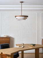 Auralyn Pendant Light – Sculptural Fabric Shade with Bronze Accents