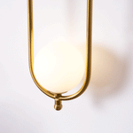 Aurea Brass Wall Sconce – Modern Minimalist Oval Glass Wall Light