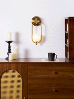 Aurea Brass Wall Sconce – Modern Minimalist Oval Glass Wall Light
