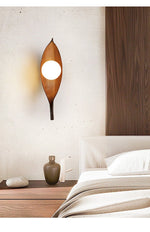 Aureo Leaf Glass Wall Sconce in Amber with Walnut Finish