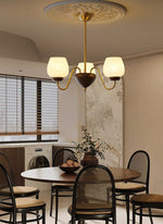 Aurorium Modern Brass Chandelier with Walnut Accents and Glass Globes