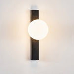 Balanced Globe Wall Sconce in Black Travertine and Opal Glass
