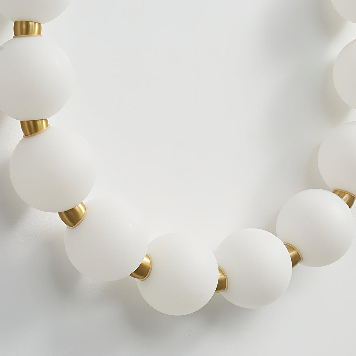 bead-cascade-loop-wall-lamp