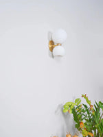 round-pearl-sconce