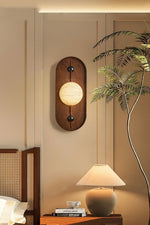 Bezel Alabaster Plug-In Wall Sconce with Walnut Accent