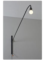 Modern Swing Arm Wall Sconce with Extended Reach in Matte Black