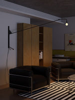 Modern Swing Arm Wall Sconce with Extended Reach in Matte Black